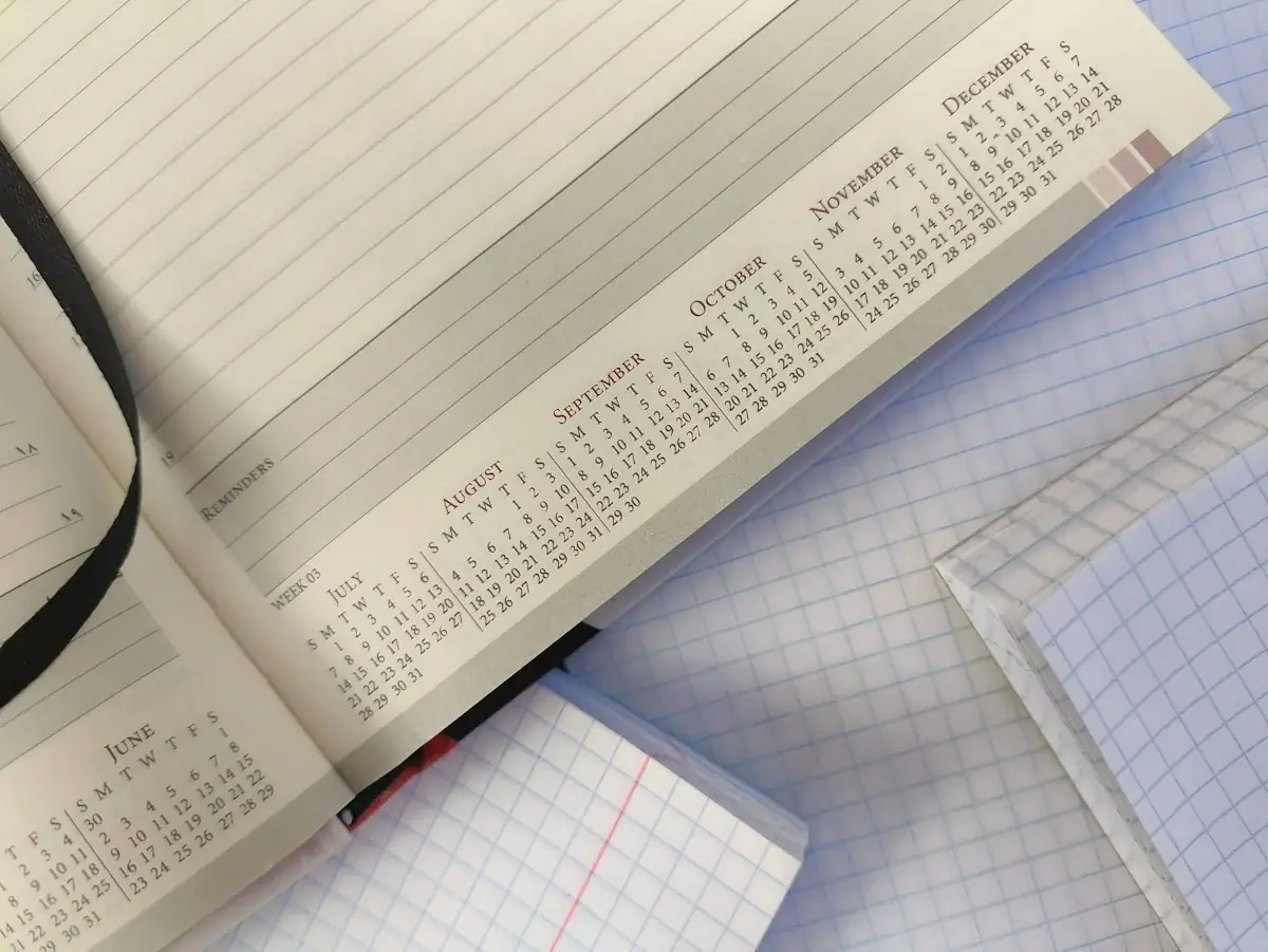 Open calendar planner and notebooks