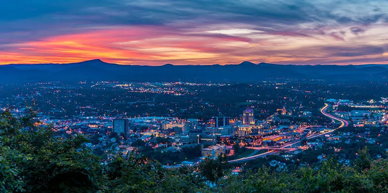 Roanoke, Virginia valley and city lights at sunset